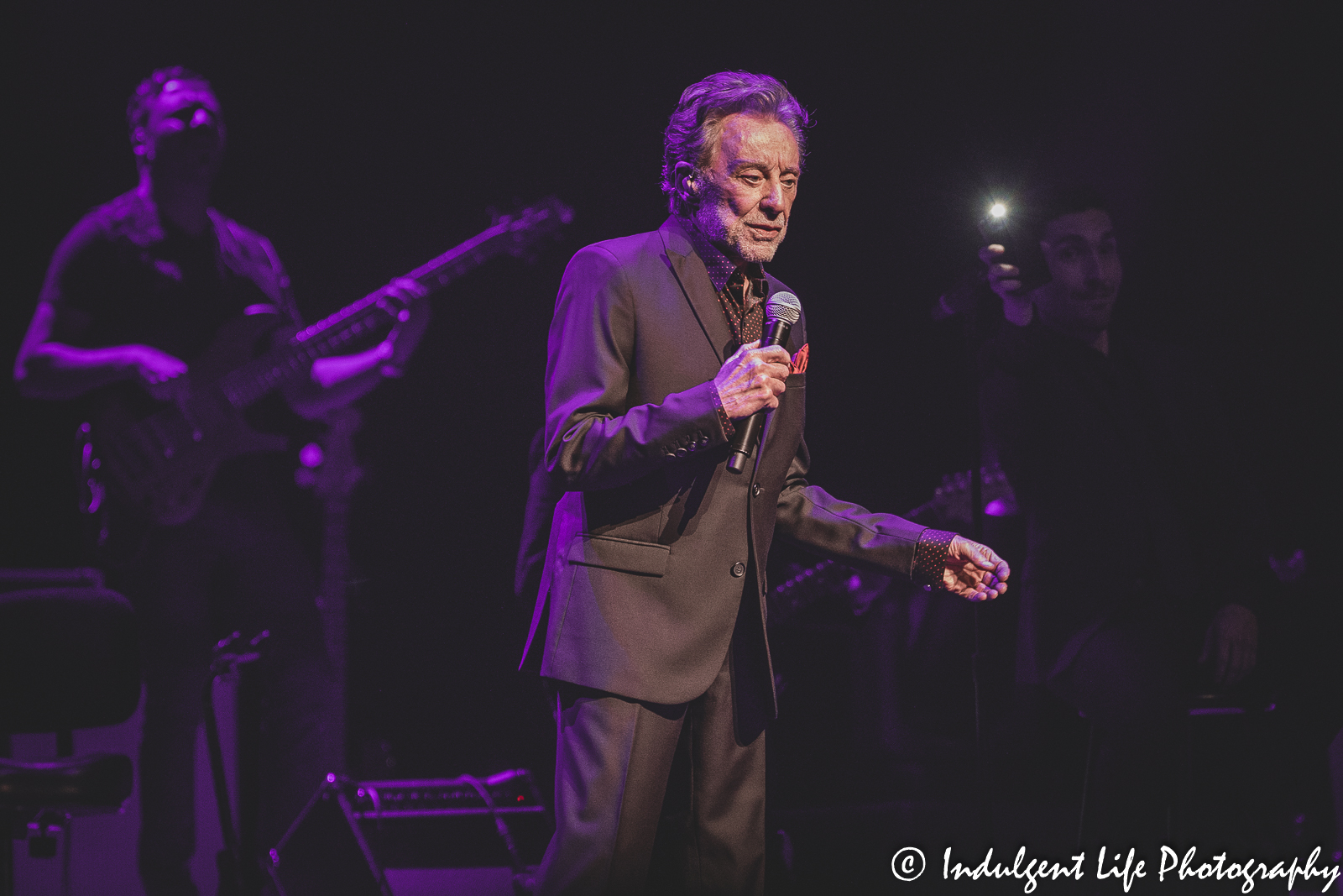 Frankie Valli performing live as fans wave their camera lights at the Kauffman Center in downtown Kansas City, MO on June 4, 2022.