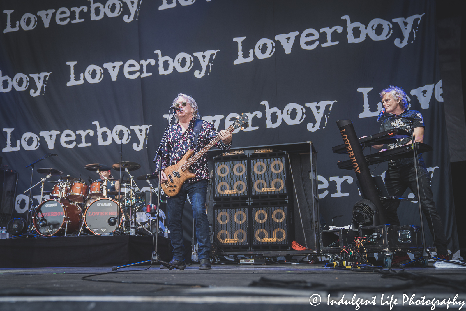 Loverboy band members Matt Frenette, Ken "Spider" Sinnaeve and Doug Johnson performing together at Starlight Theatre in Kansas City, MO June 14, 2022.