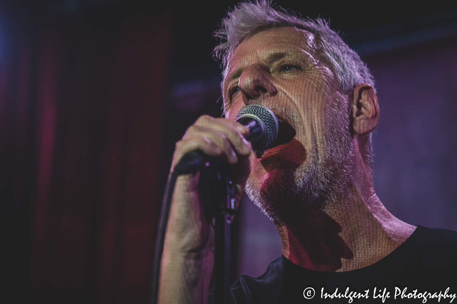 Modern English lead singer Robbie Grey singing live at the recordBar in downtown Kansas City, MO on June 24, 2022.