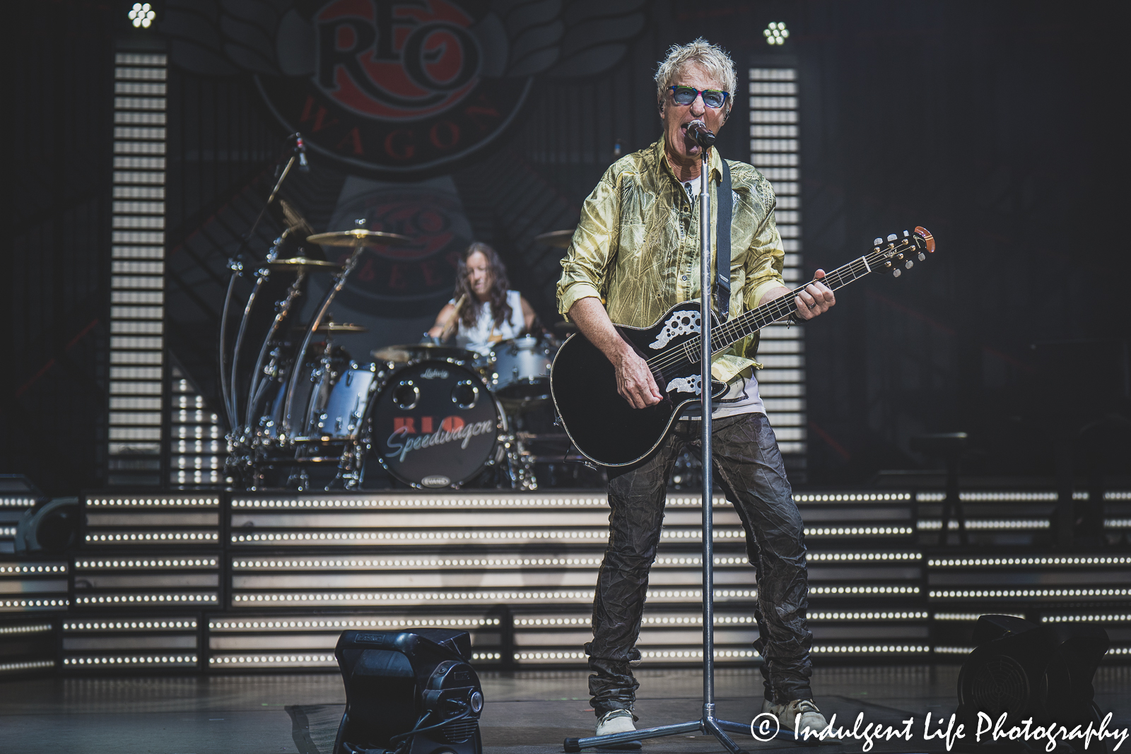 REO Speedwagon frontman and guitarist Kevin Cronin performing live with drummer Bryan Hitt at Starlight Theatre in Kansas City, MO on June 14, 2022.