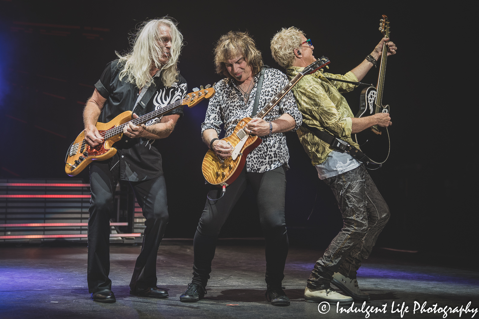 REO Speedwagon guitarists Bruce Hall, Dave Amato and Kevin Cronin playing live together at Starlight Theatre in Kansas City, MO on Ju e 14, 2022.