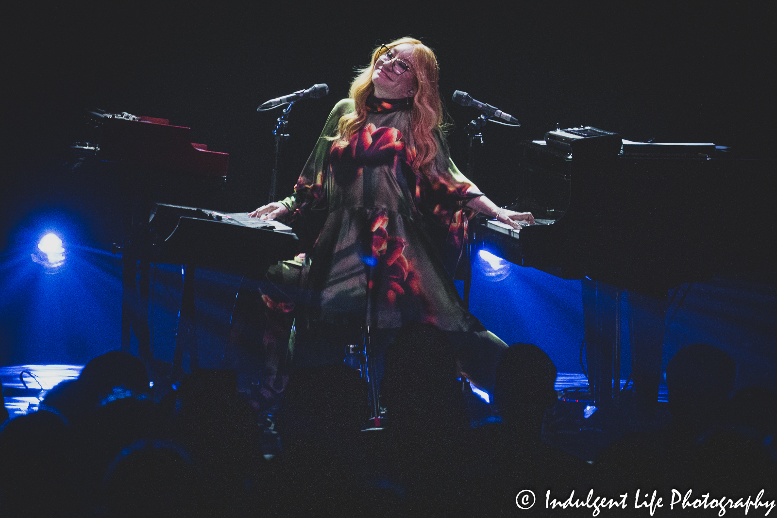 Pop rock artist Tori Amos playing the piano and keyboard simultaneously during her performance at Kansas City Music Hall on May 31, 2022.