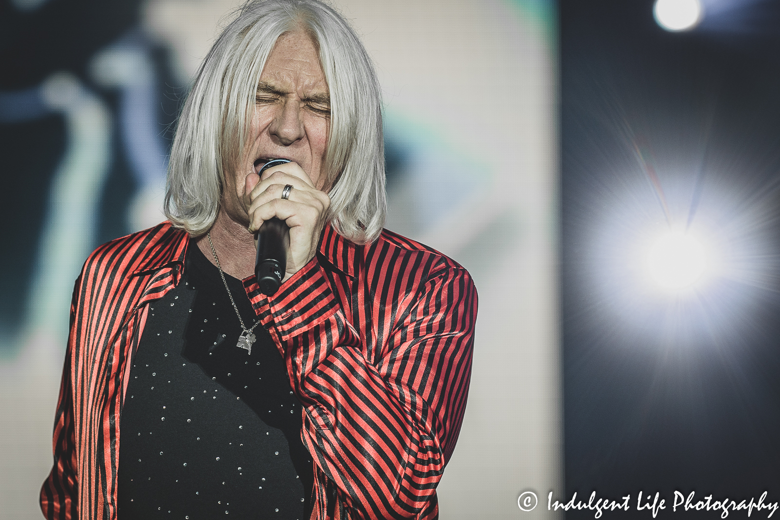 Def Leppard lead singer Joe Elliot performing live during the stadium tour concert at Kauffman Stadium in Kansas City, MO on July 19, 2022.