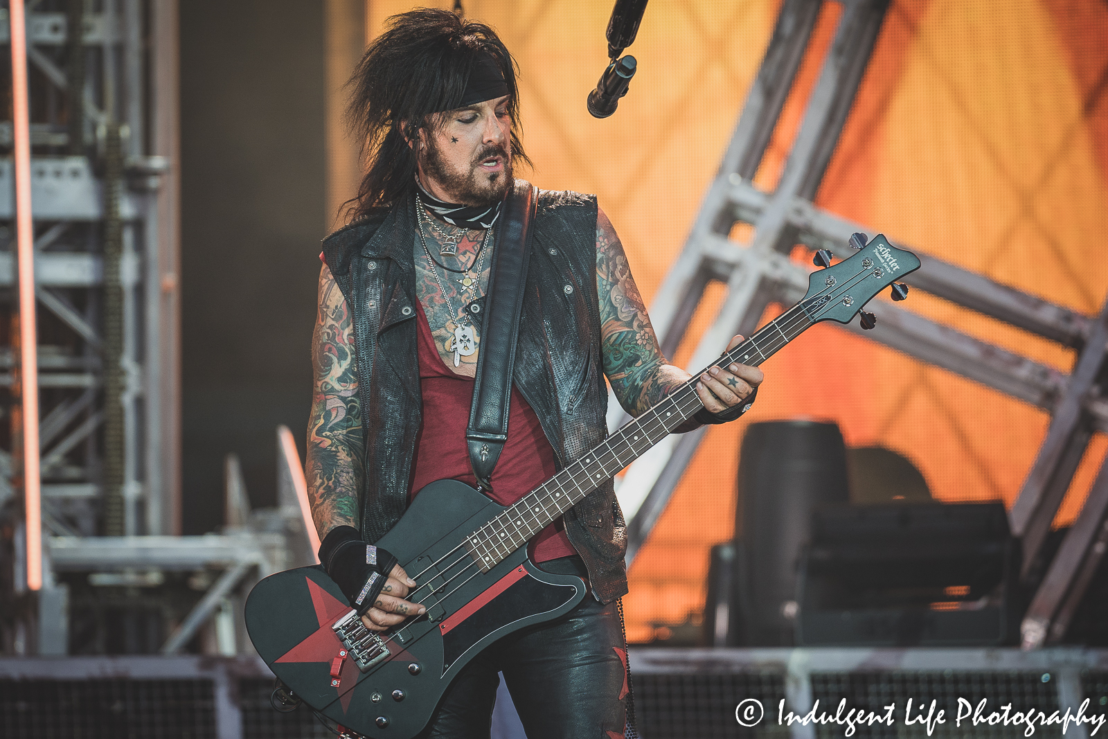 Mötley Crüe bass guitarist Nikki Sixx playing live during the stadium tour stop at Kauffman Stadium in Kansas City, MO on July 19, 2022.