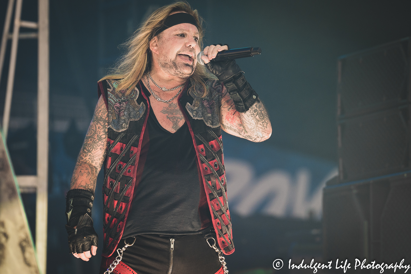 Mötley Crüe frontman Vince Neil performing "Wild Side" during the band's concert at Kauffman Stadium in Kansas City, MO on July 19, 2022.