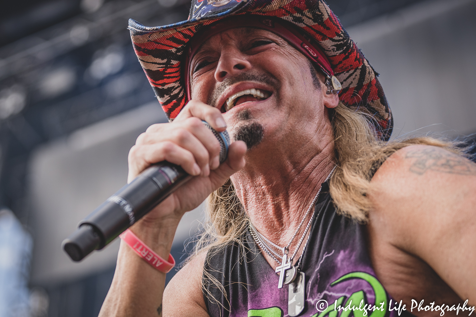 Frontman Bret Michaels of Poison singing live during the band's concert at Kauffman Stadium in Kansas City, MO on July 19, 2022.