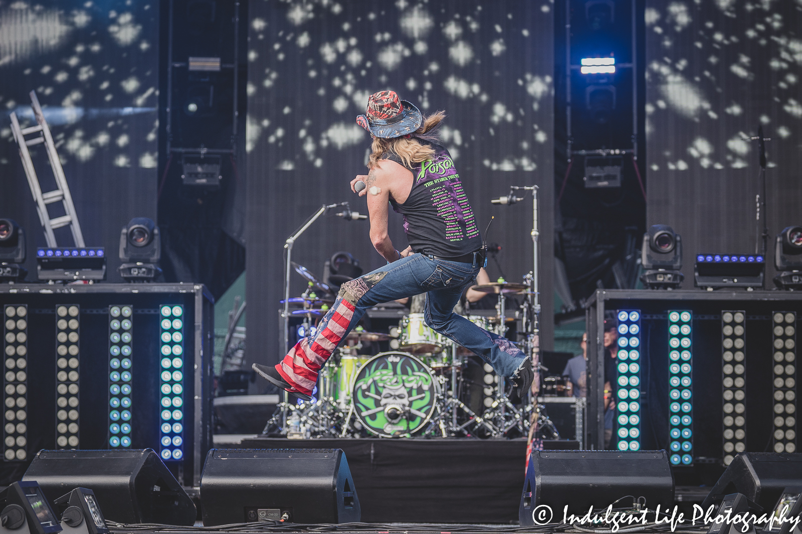 Bret Michaels defying gravity during a performance of "Ride the Wind" at Kauffman Stadium in Kansas City, MO on July 19, 2022.
