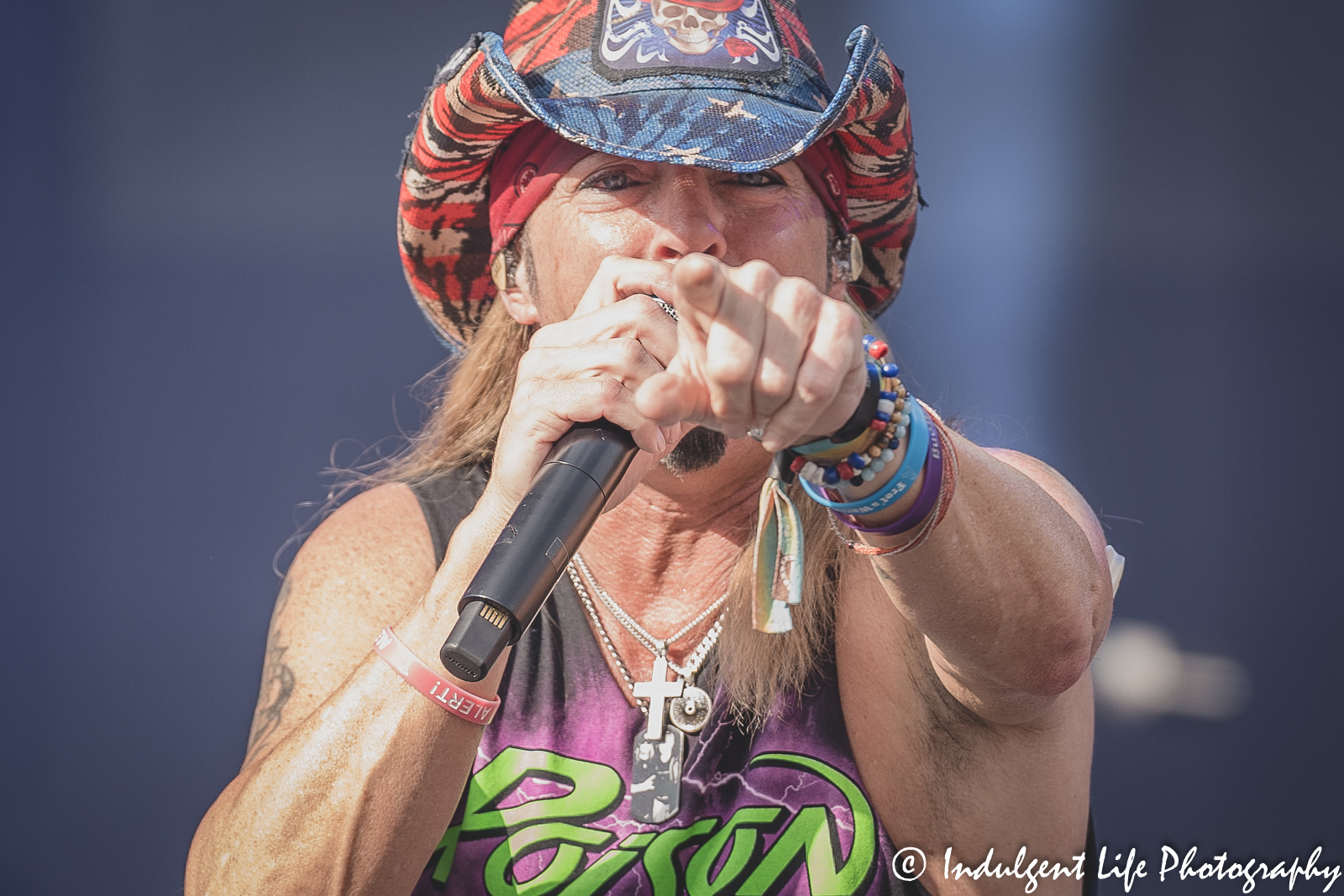 Poison frontman Bret Michaels singing "Look What the Cat Dragged In" during the stadium tour stop at Kauffman Stadium in Kansas City, MO on July 19, 2022.