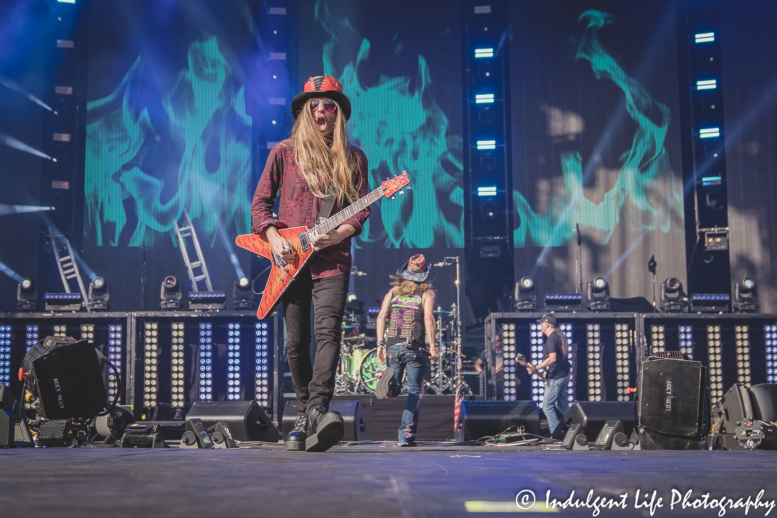 Poison lead guitarist C.C. DeVille heading down the ramp during the stadium tour concert at Kauffman Stadium in Kansas City, MO on July 19, 2022.