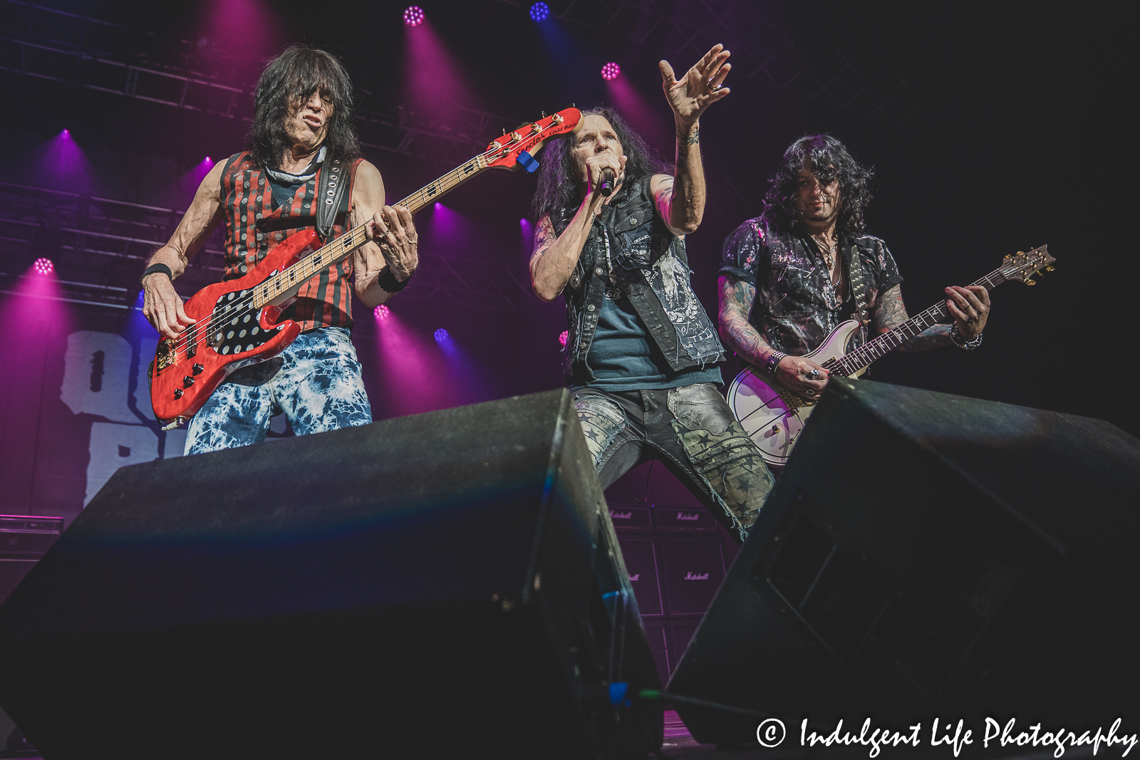 Quiet Riot band members Rudy Sarzo, Jizzy Pearl and Alex Grossi performing live together at Ameristar Casino's Star Pavilion in Kansas City, MO on July 29, 2022.