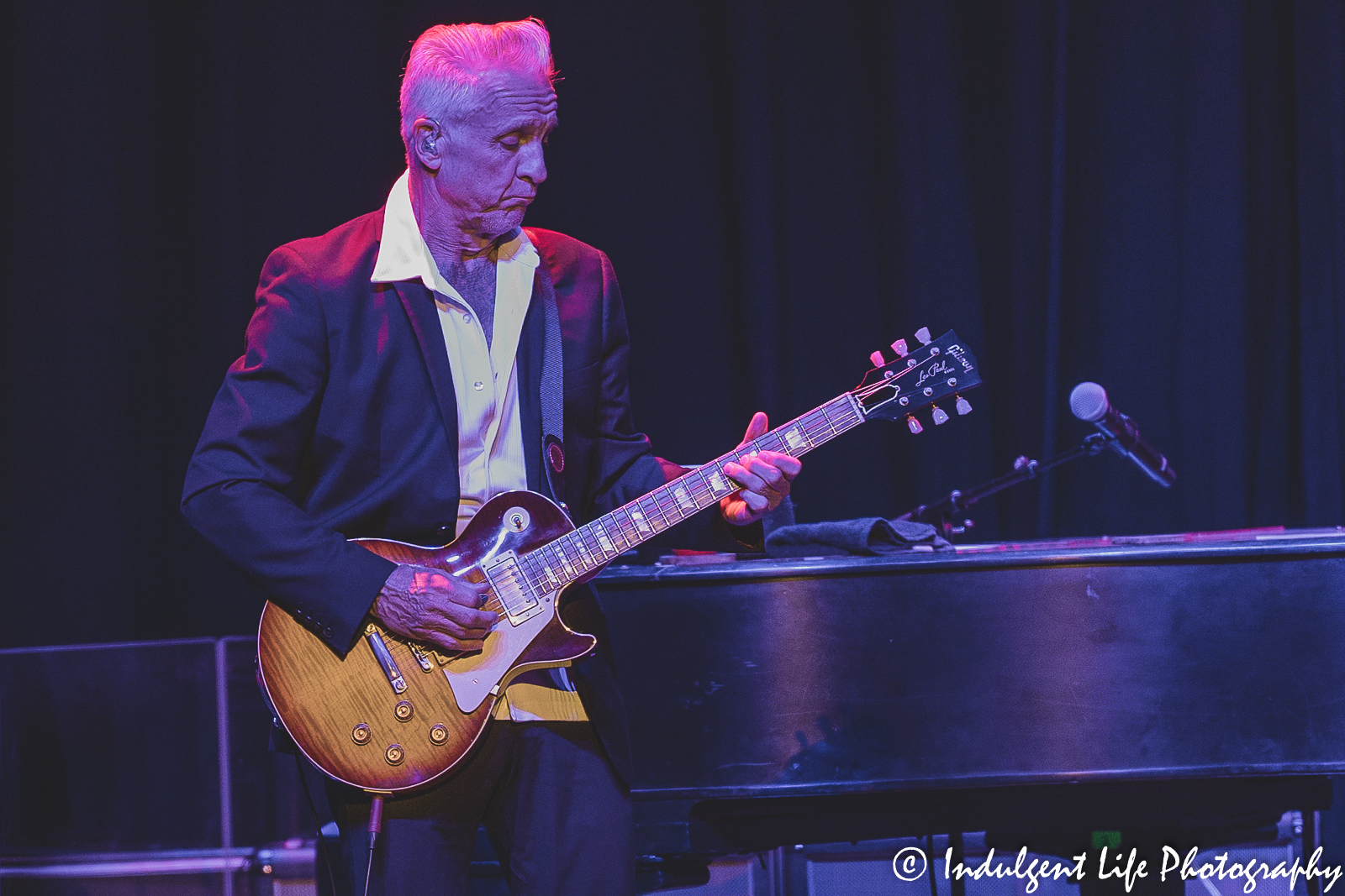 Neil "Spyder" Giraldo playing the guitar live in concert at Uptown Theater in Kansas City, MO on August 2, 2022.