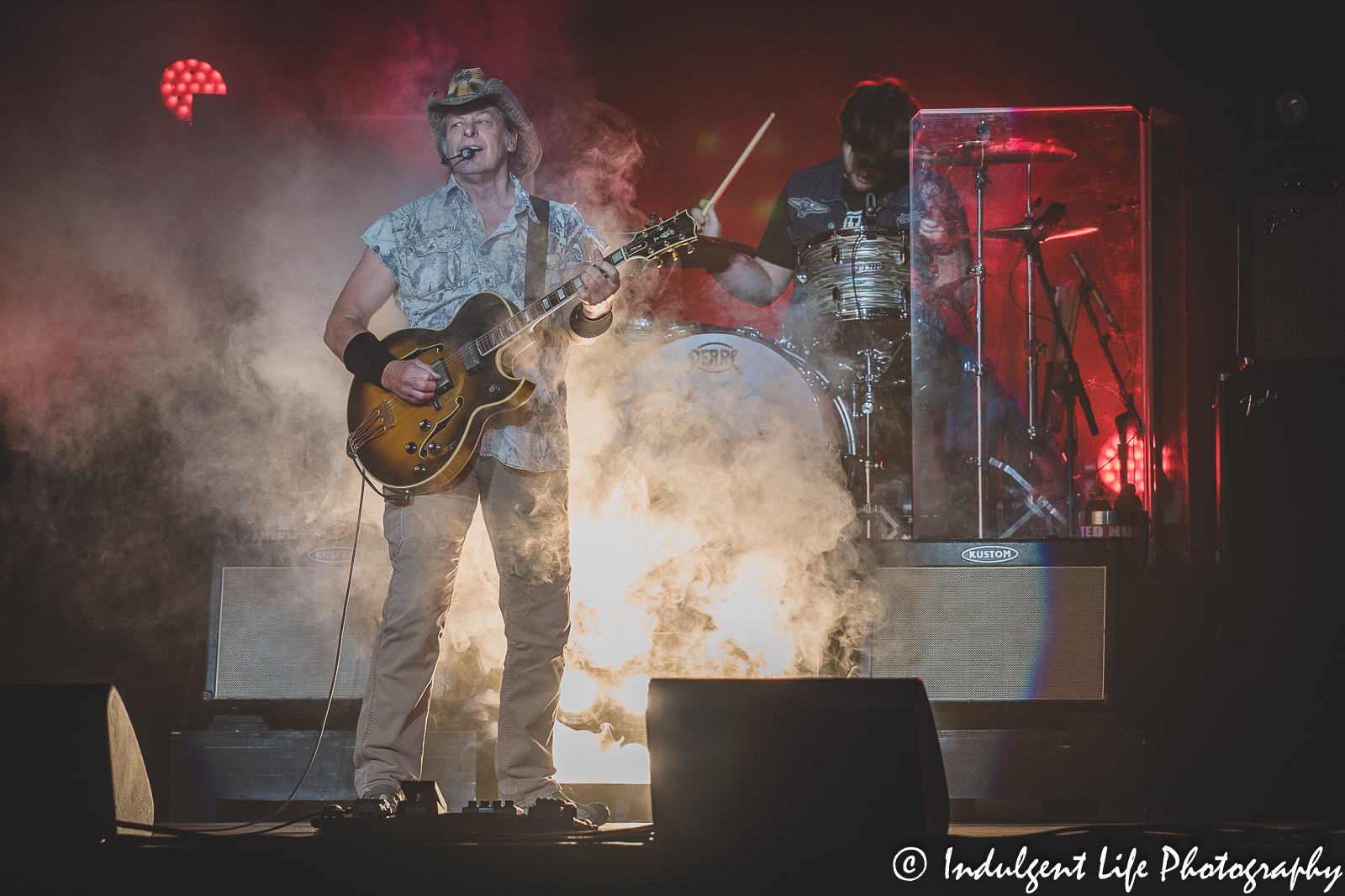 Ted Nugent performing live with drummer Jason Hartless at Star Pavilion inside of Ameristar Casino in Kansas City, MO on August 6, 2022.