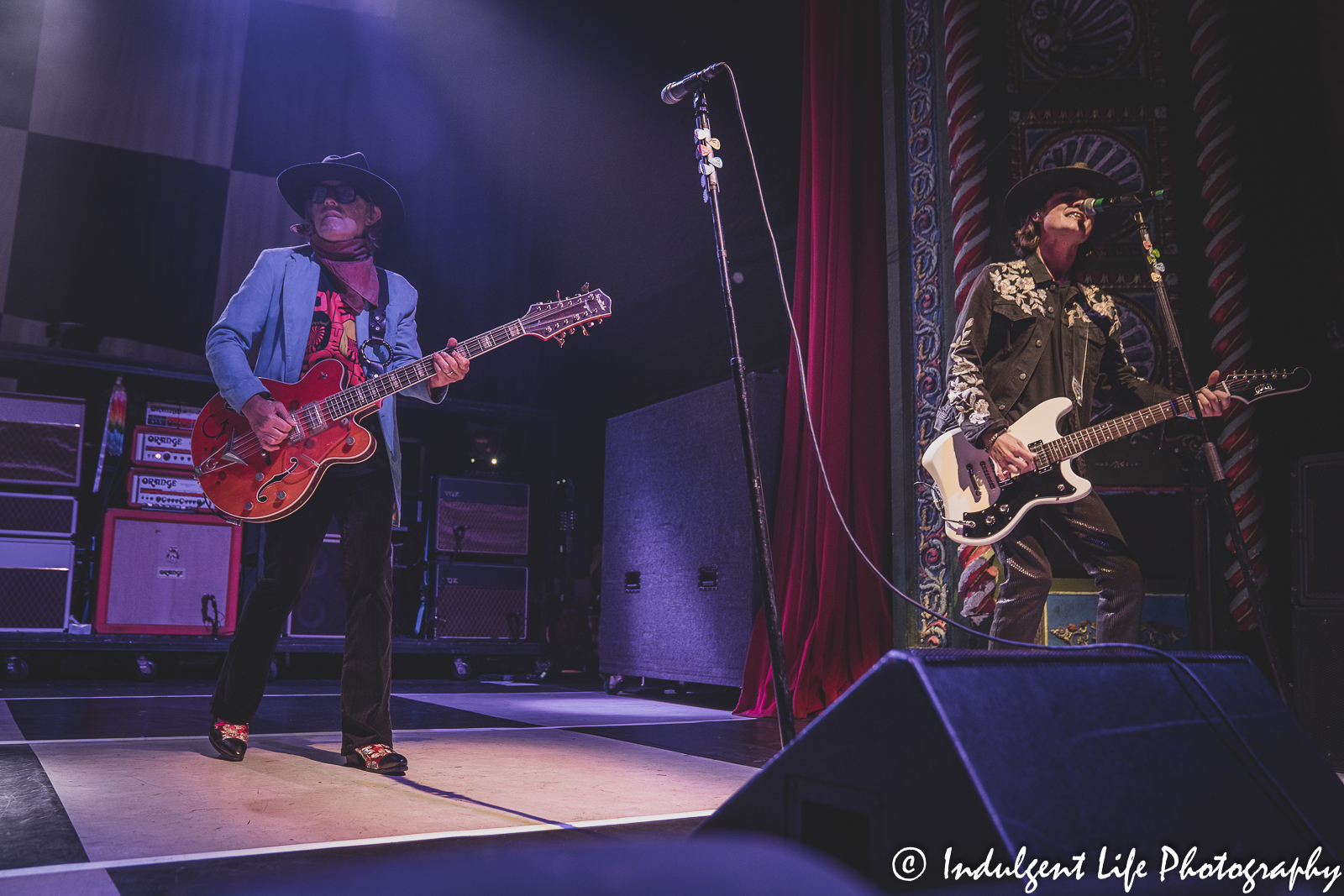 Cheap Trick bass player Tom Petersson and guitarist Robin Taylor Zander performing together at Uptown Theater in Kansas City, MO on September 13, 2022.