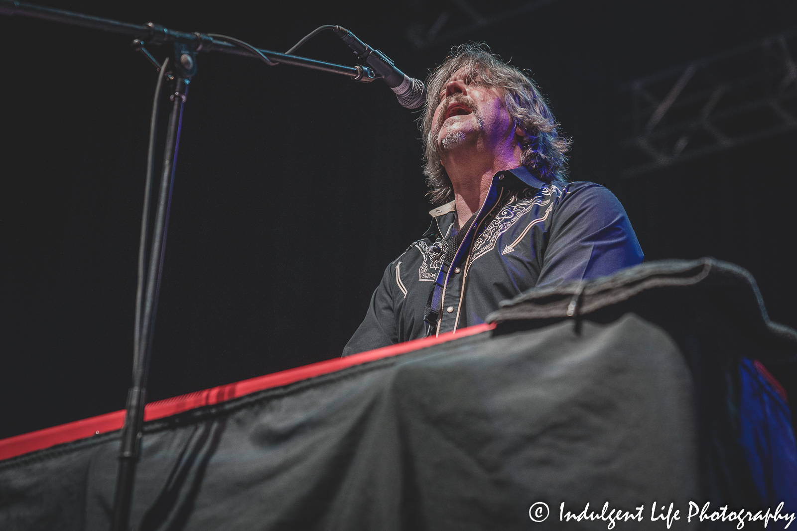 The Marshall Tucker Band member Marcus James Henderson playing the keyboard and singing live at Ameristar Casino in Kansas City, MO on October 28, 2022.