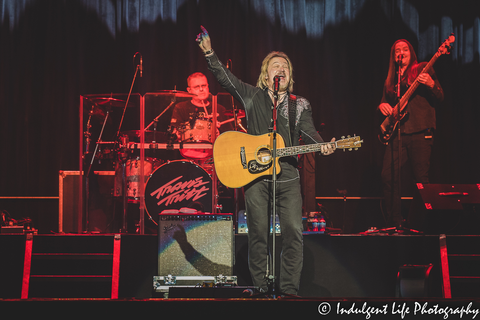 Travis Tritt belting a note as he performed live at Ameristar Casino Hotel Kansas City on December 10, 2022.