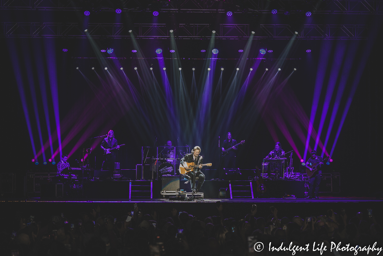Travis Tritt starting his seated portion of his set at at Ameristar Casino's Star Pavilion on December 10, 2022.