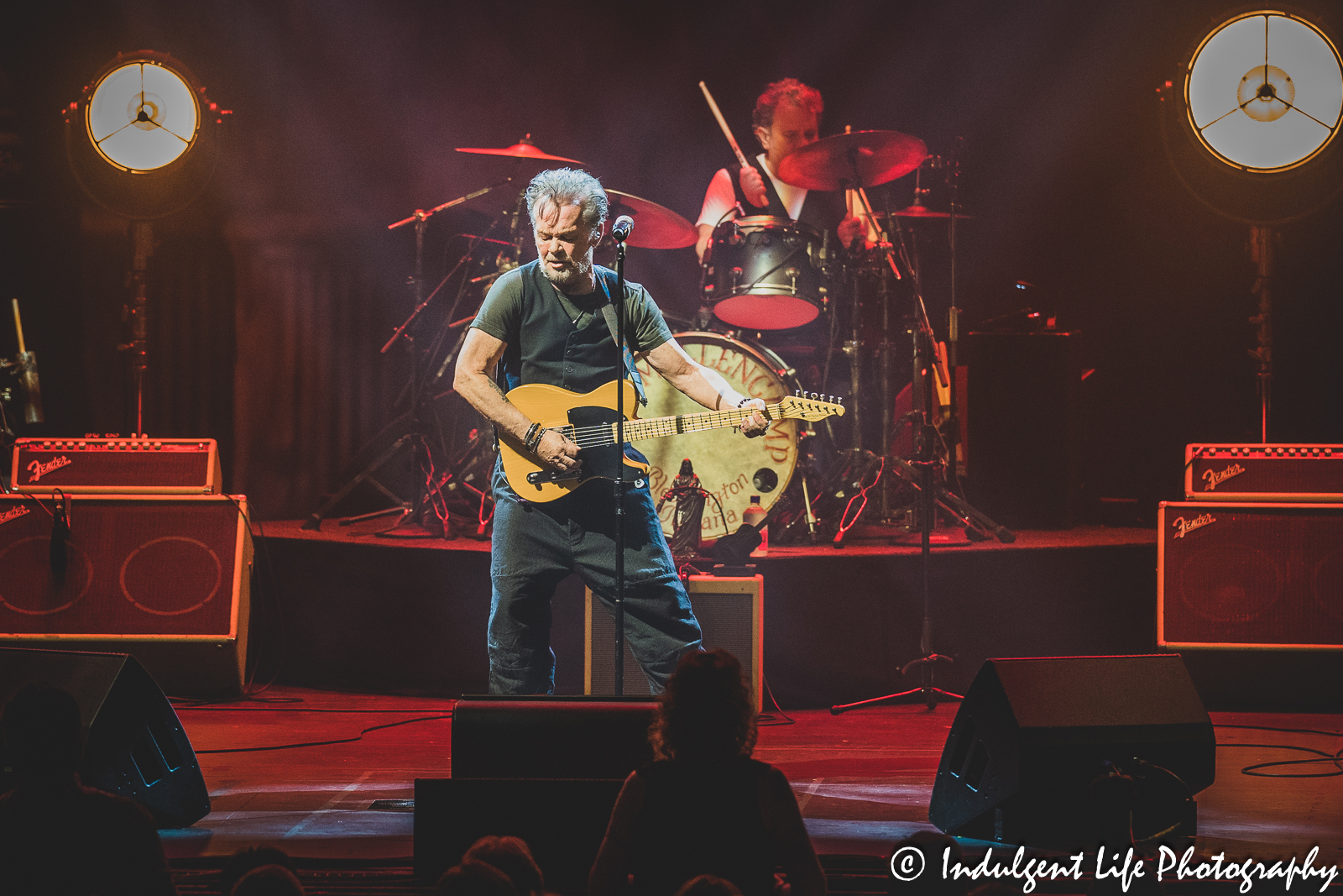 John Mellencamp playing the guitar and performing "Paper in Fire" live at The Midland Theatre in downtown Kansas City, MO on April 4, 2023.