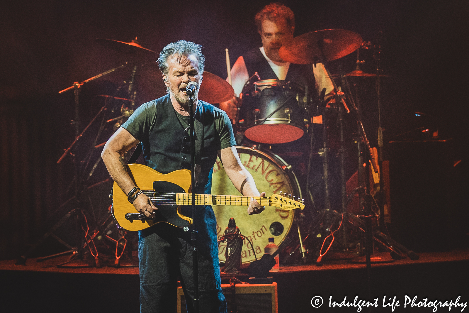 John Mellencamp performing "Paper in Fire" with drummer Dane Clark at The Midland Theatre in downtown Kansas City, MO on April 4, 2023.