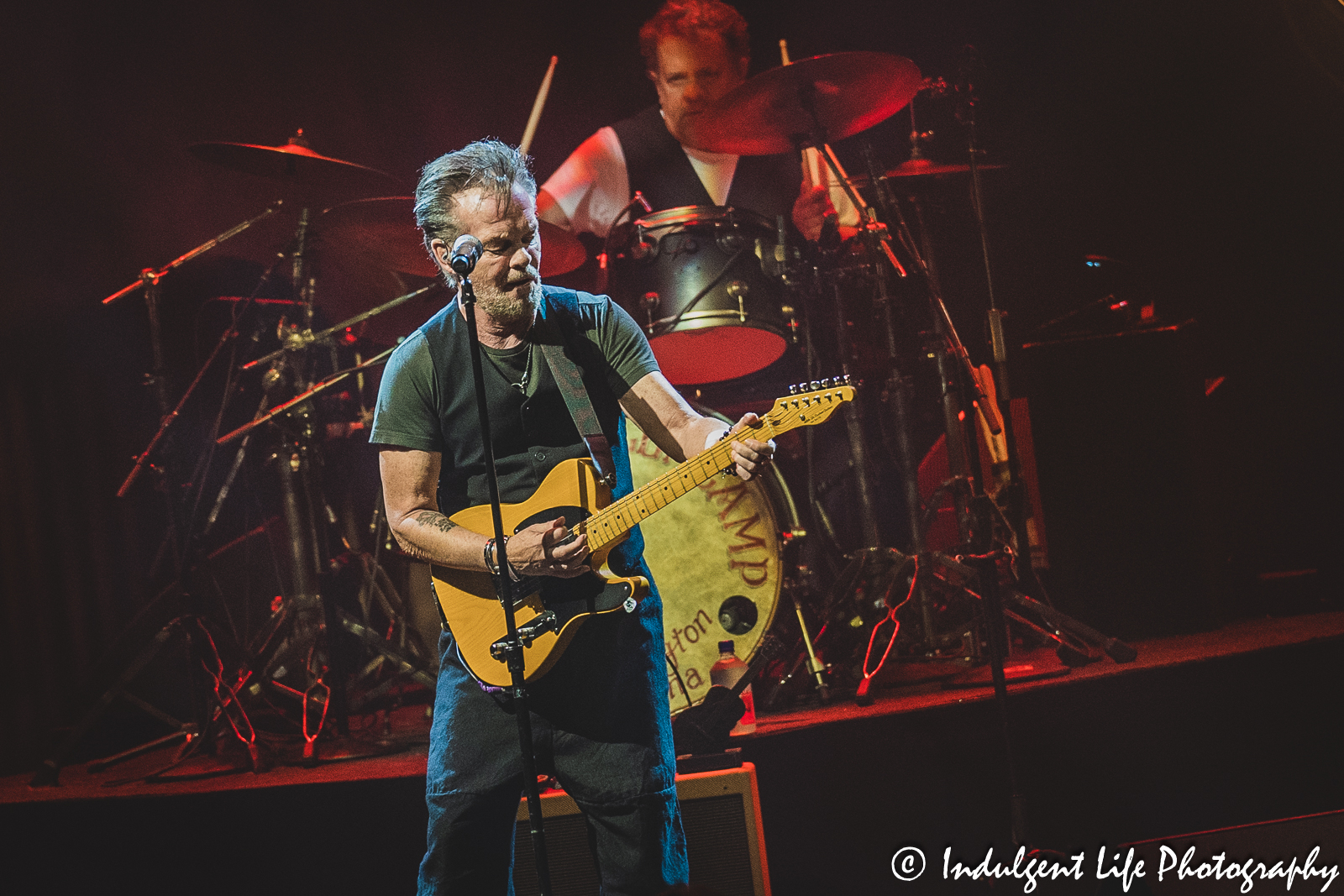 John Mellencamp and drummer Dane Clark performing "Paper in Fire" at The Midland Theatre in downtown Kansas City, MO on April 4, 2023.