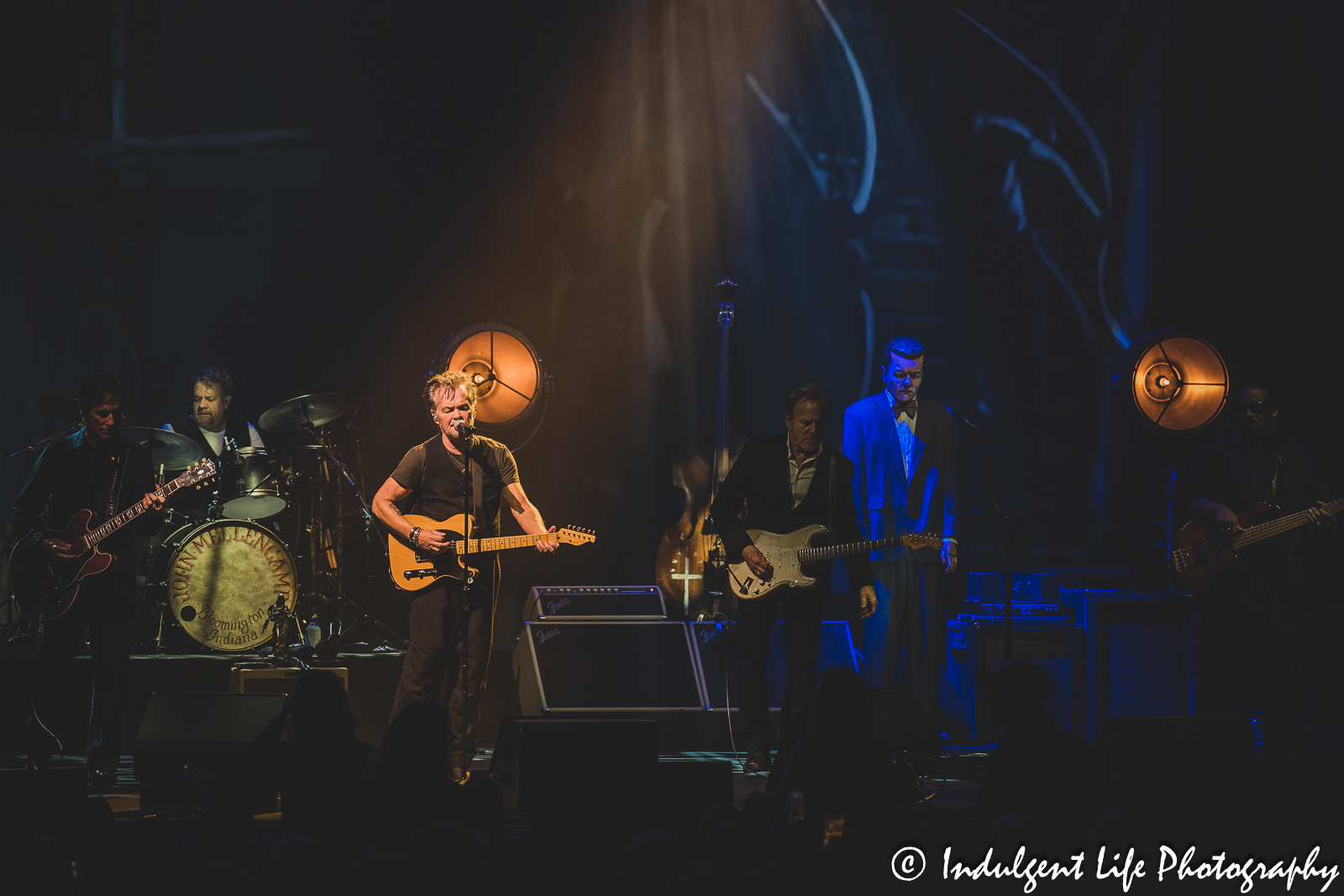 John Mellencamp performing live with guitarist Andy York, drummer Andy Clark, guitarist Mike Wachic and bass player John Gunnell at The Midland Theatre in downtown Kansas City, MO on April 4, 2023.