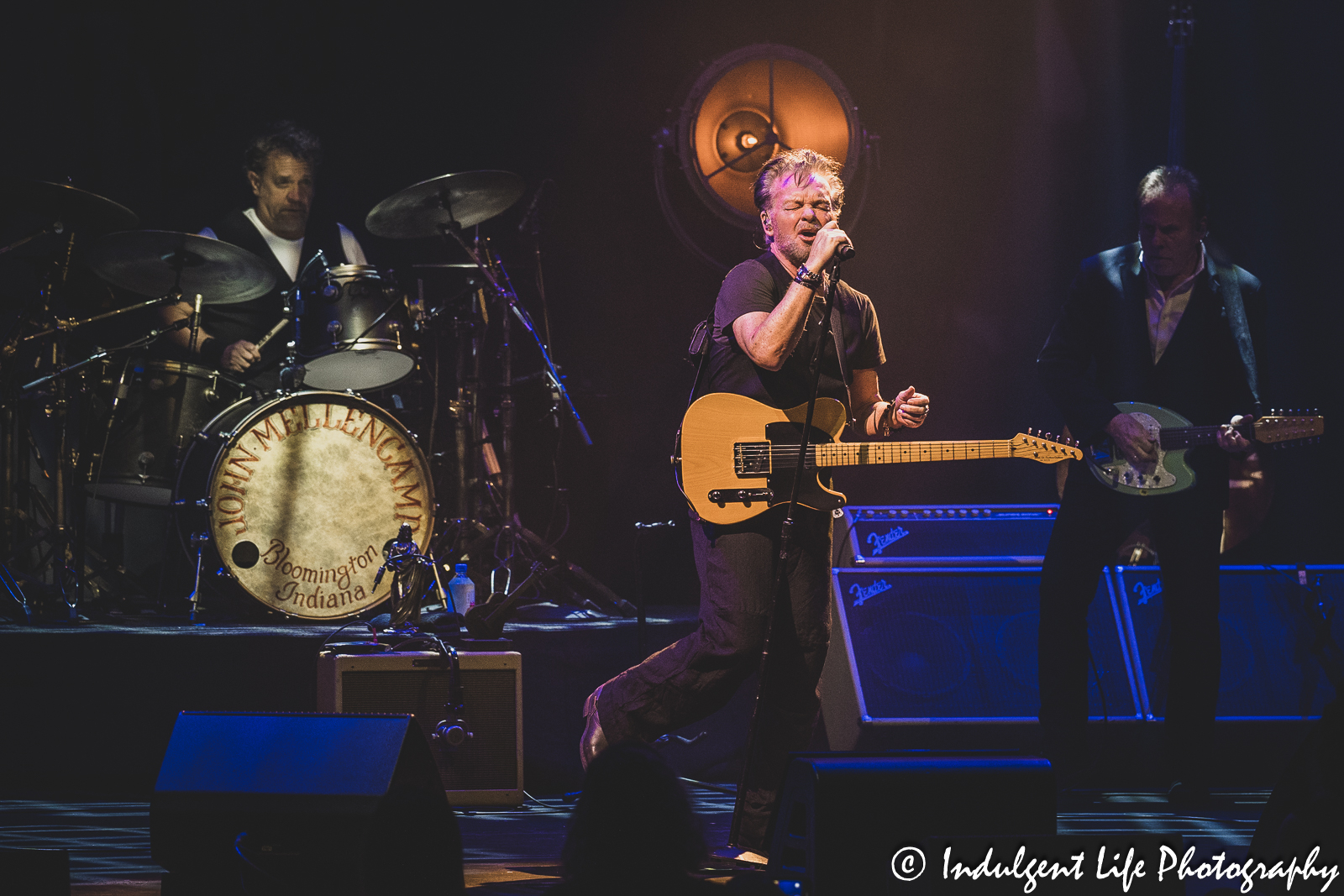 John Mellencamp live in concert with drummer Dane Clark and guitarist Mike Wanchic at The Midland Theatre in downtown Kansas City, MO on April 4, 2023.