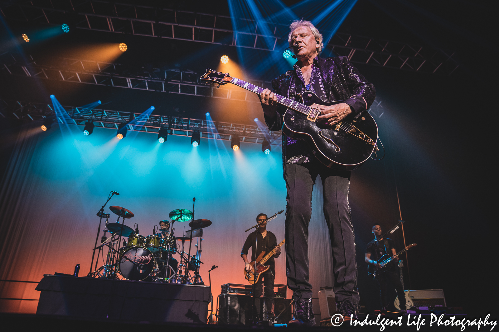 Guitarist and singer Graham Russell of soft rock duo Air Supply performing "Just as I Am" live in concert at Ameristar Casino's Star Pavilion in Kansas City, MO on May 5, 2023.