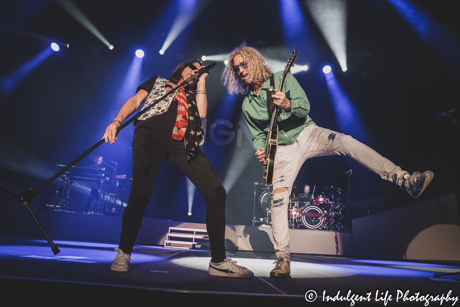 Foreigner lead singer Kelly Hansen and guitarist Bruce Watson performing together at Hartman Arena in Park City, KS on April 30, 2023.