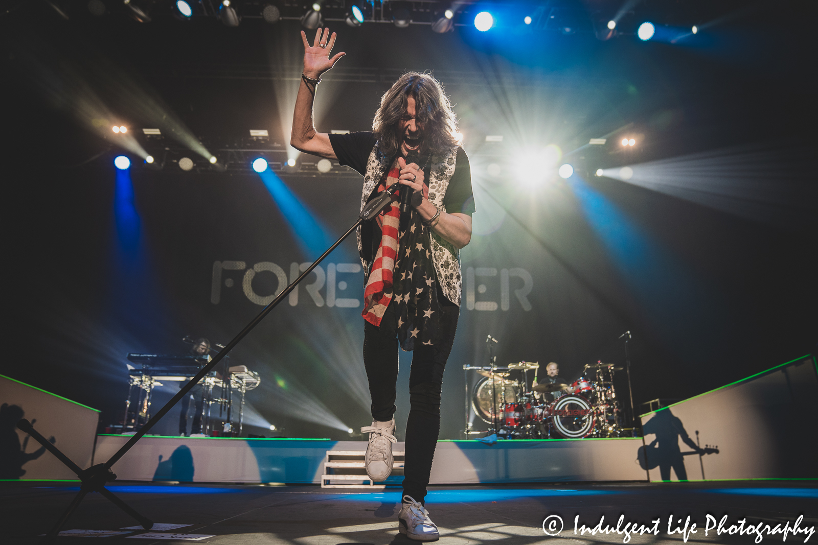 Lead singer Kelly Hansen of Foreigner belting out "Cold as Ice" as he performs live at Hartman Arena in Park City, KS on April 30, 2023.