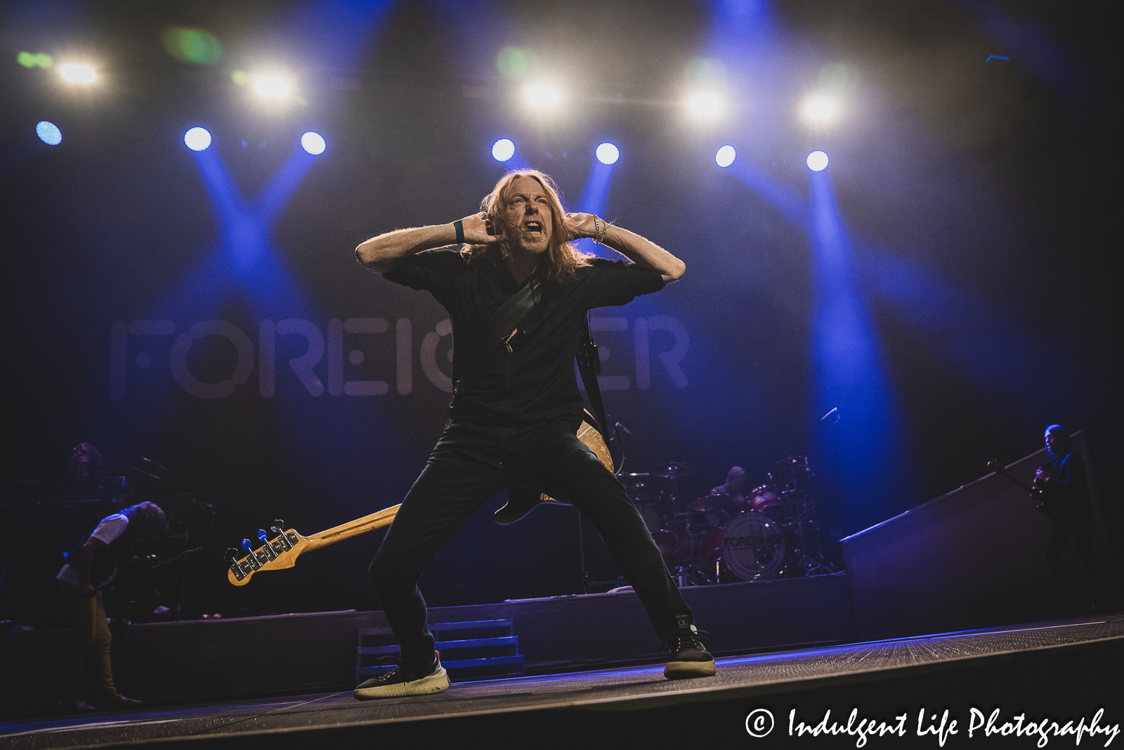 Foreigner bass player Jeff Pilson getting the crowd excited for "Cold as Ice" at Stormont Vail Events Center in Topeka, KS on May 2, 2203.