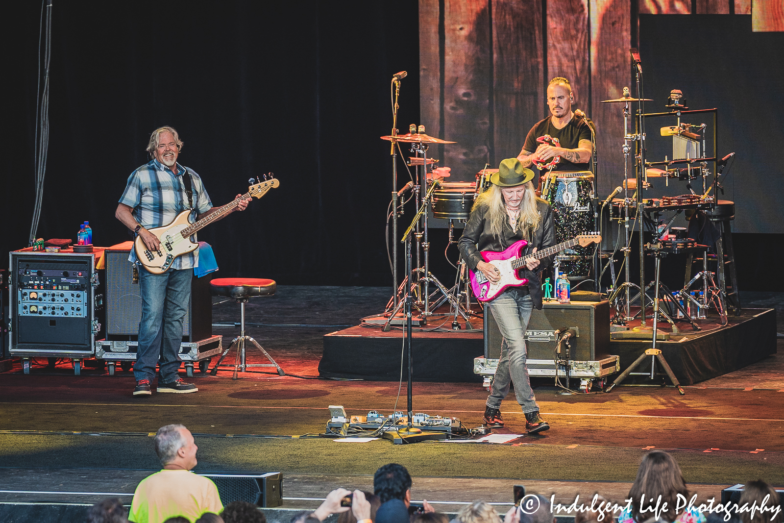 Founding member Patrick Simmons of The Doobie Brothers along with touring members John Cowan on bass and Marc Quiñones on percussion at Starlight Theatre in Kansas City, MO on June 14, 2023.