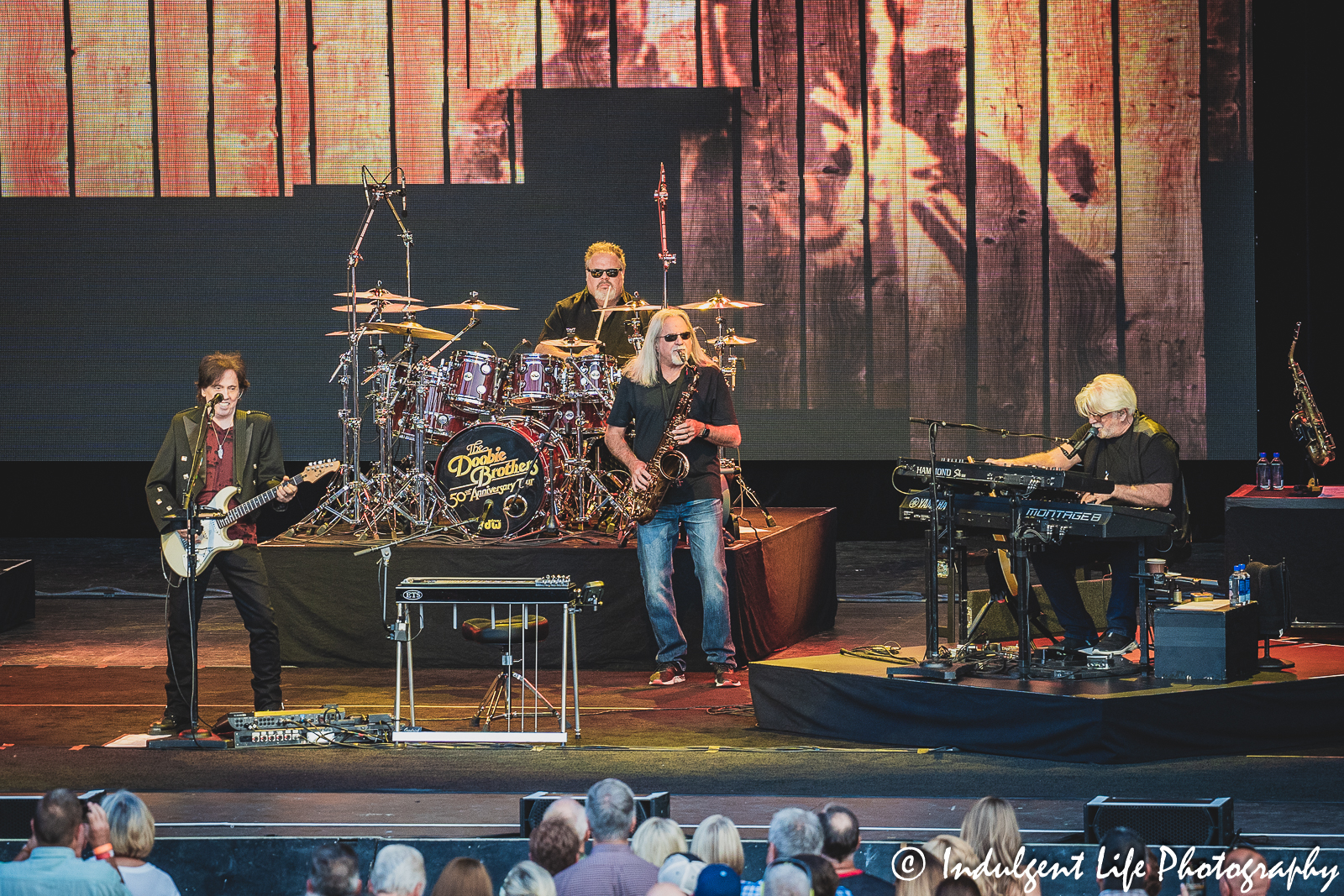 Doobie Brothers founding member John McFee and classic member Michael McDonald along with tour members Marc Russo on saxophone and Ed Toth on drums at Starlight Theatre in Kansas City, MO on June 14, 2023.