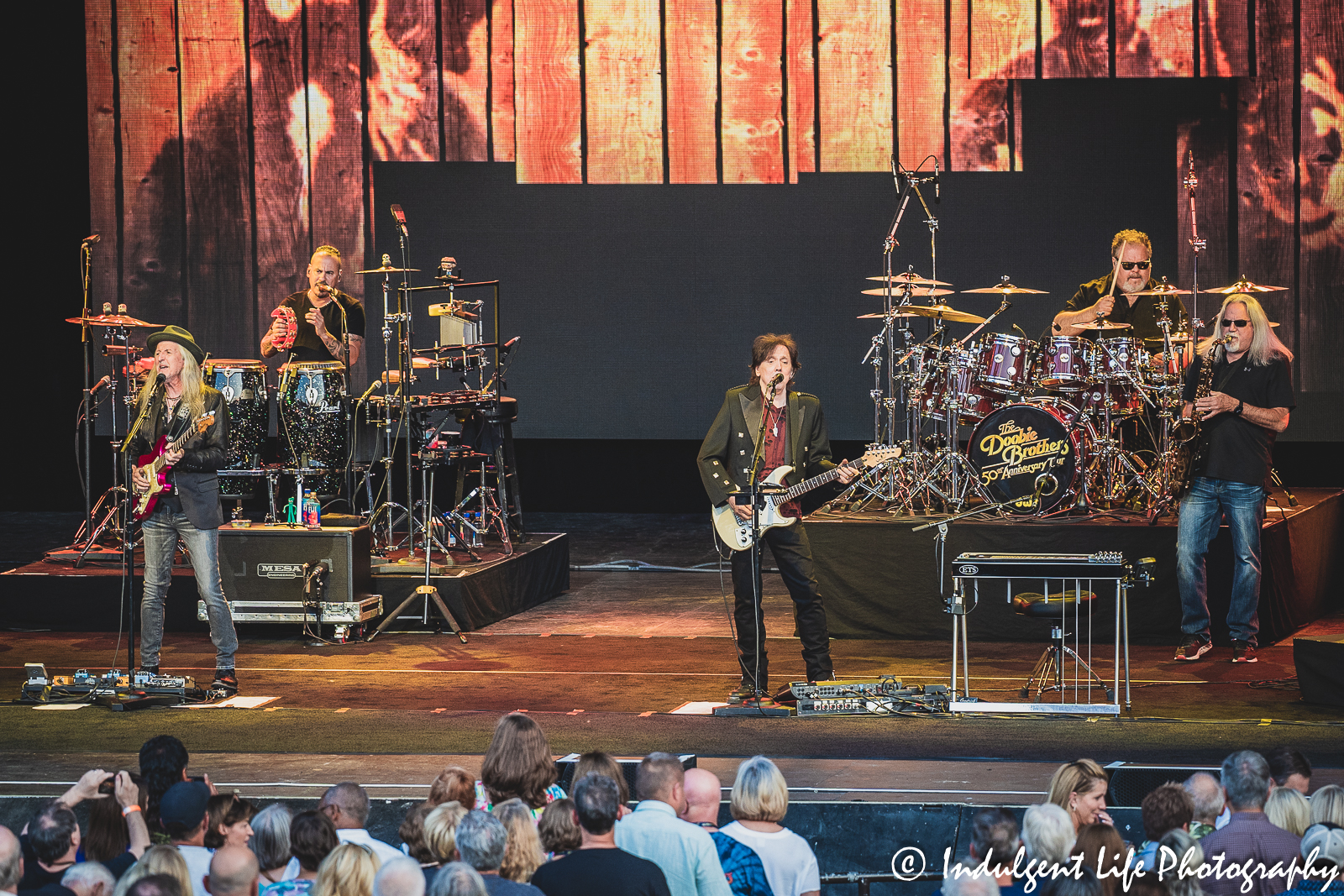 Founding members Patrick Simmons and John McFee of The Doobie Brothers live on stage with percussionist Marc Quiñones, drummer Ed Toth and saxophone player Marc Russo at Starlight Theatre in Kansas City, MO on June 14, 2023.