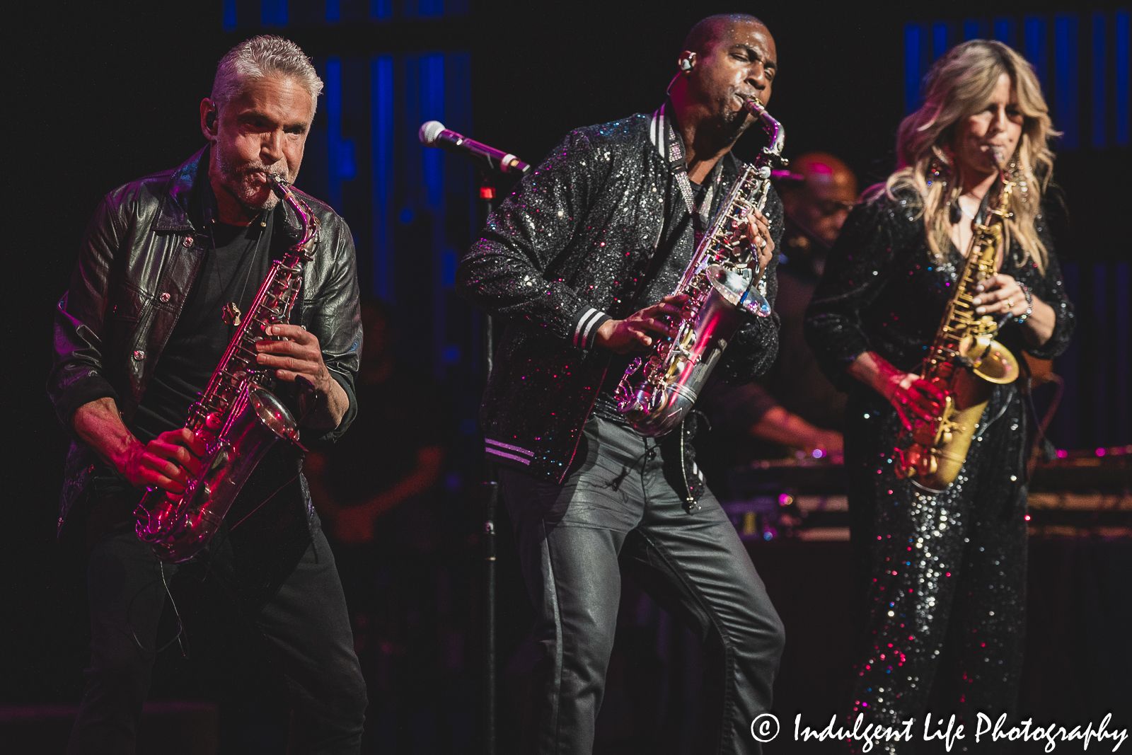 Dave Koz, Eric Darius and Candy Dulfer playing saxophones together live at Kauffman Center for the Performing Arts in downtown Kansas City, MO on July 15, 2023.