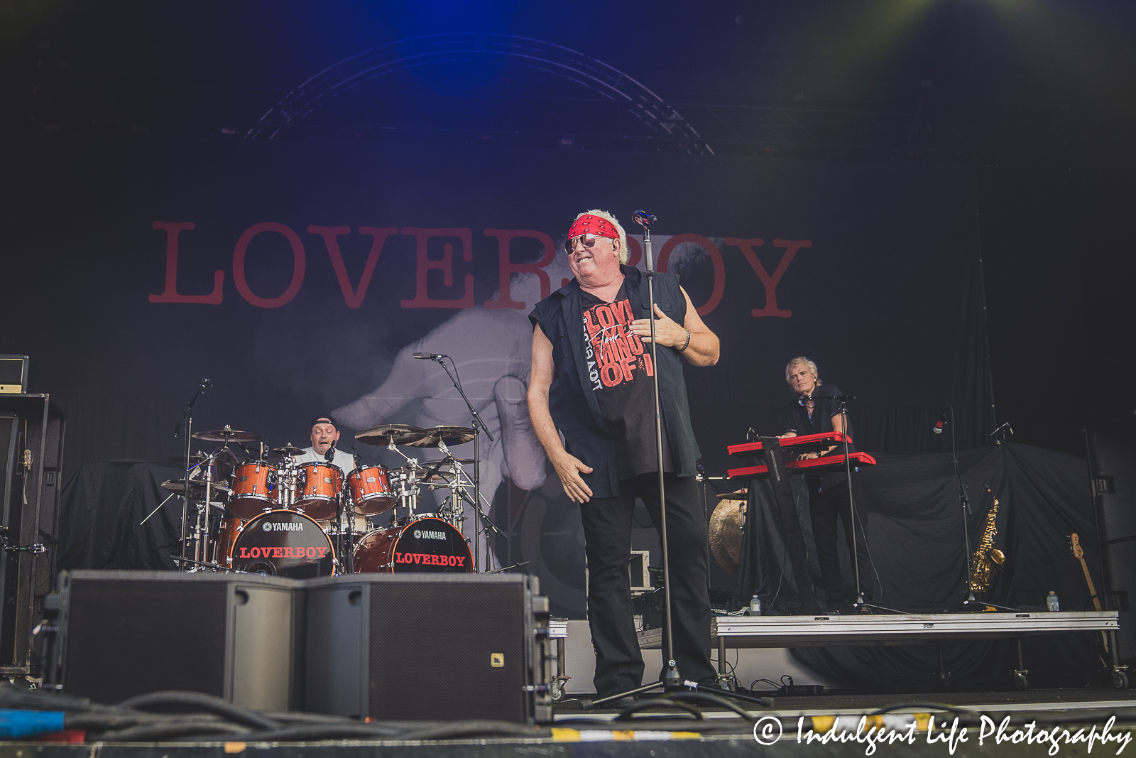 Loverboy band members Mike Reno, Matt Frenette and Doug Johnson performing live together at Starlight Theatre in Kansas City, MO on July 18, 2023.