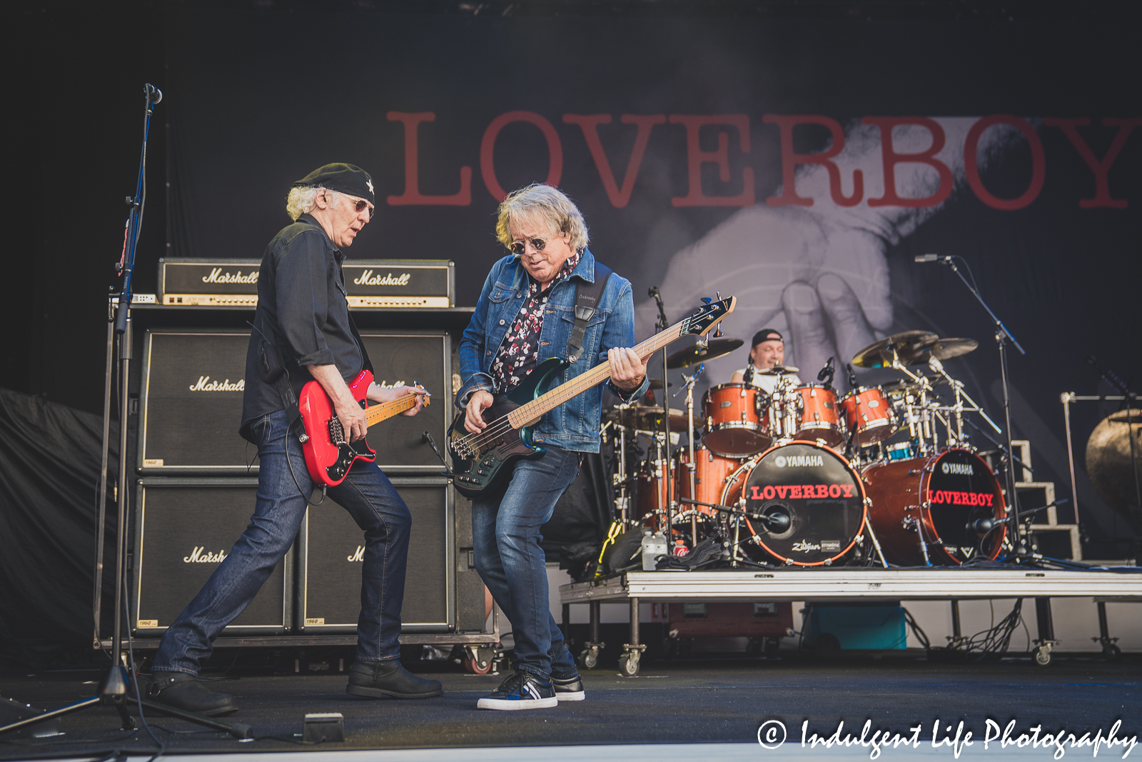 Loverboy band members Paul Dean, Ken "Spider" Sinnaeve and Matt Frenette live in concert together at Starlight Theatre in Kansas City, MO on July 18, 2023.