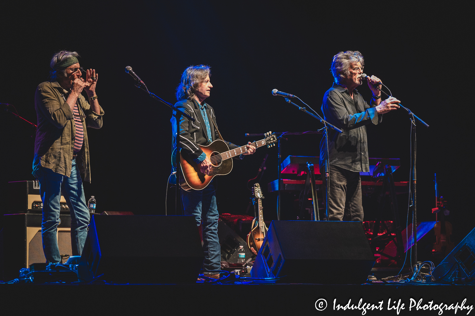 Nitty Gritty Dirt Band members Jimmie Fadden, Jeff Hanna and Bob Carpenter performing together at Ameristar Casino Hotel Kansas City on July 8, 2023.
