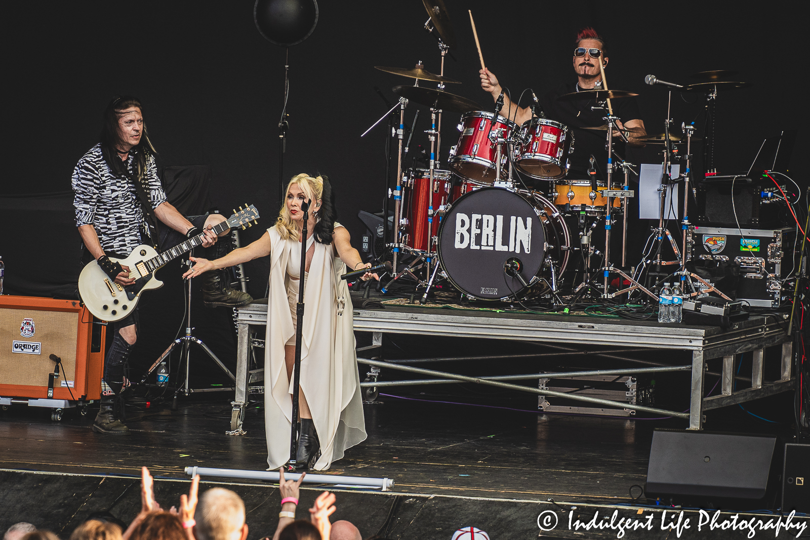 Frontwoman Terri Nunn of Berlin with drummer Ric "Rocc" Roccapriore and guitarist Carlton Bost at Starlight Theatre in Kansas City, MO on August 8, 2023.