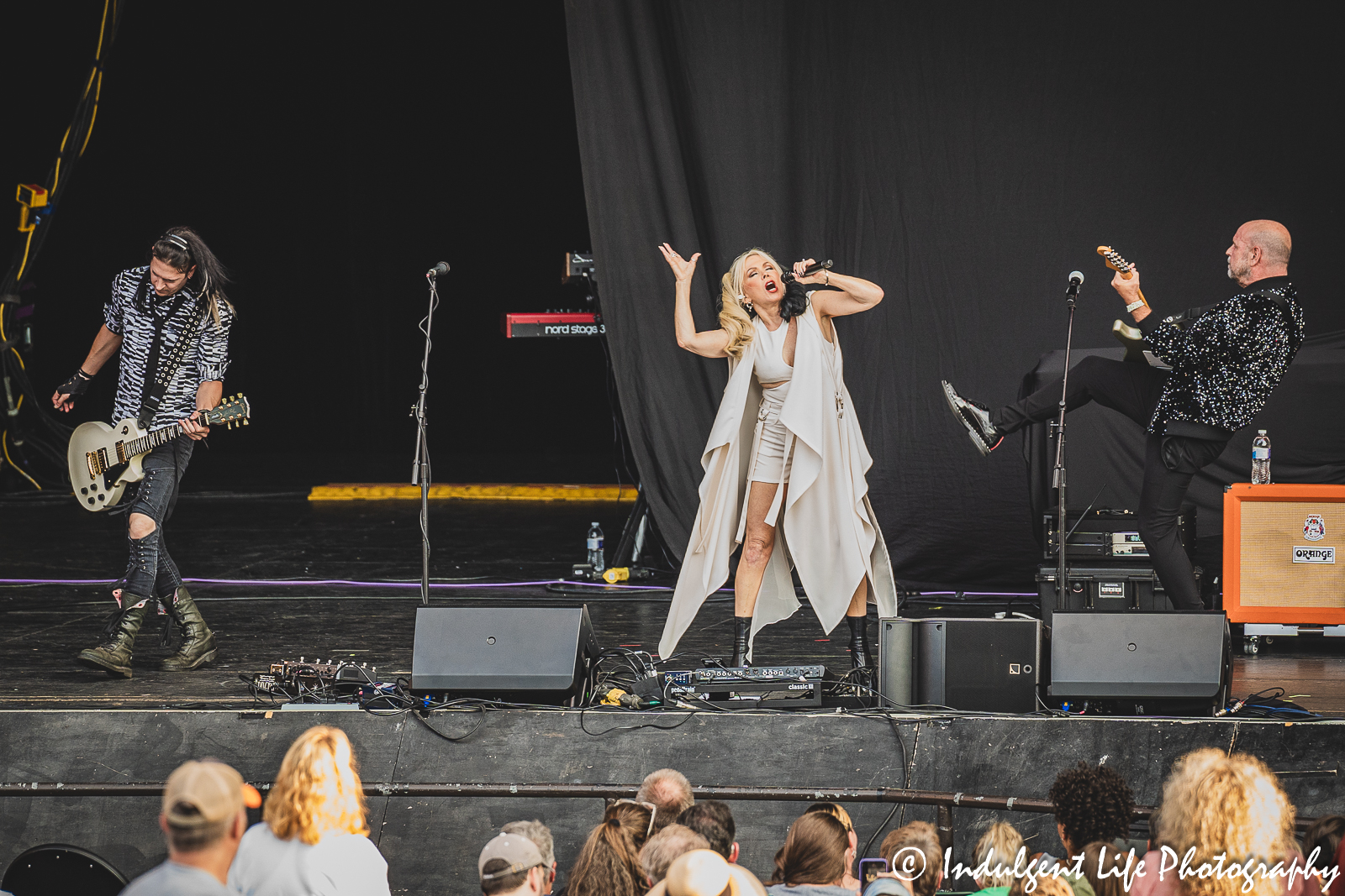 Berlin frontwoman Terri Nunn of Berlin with guitarists Carlton Bost and David Diamond at Starlight Theatre in Kansas City, MO on August 8, 2023.