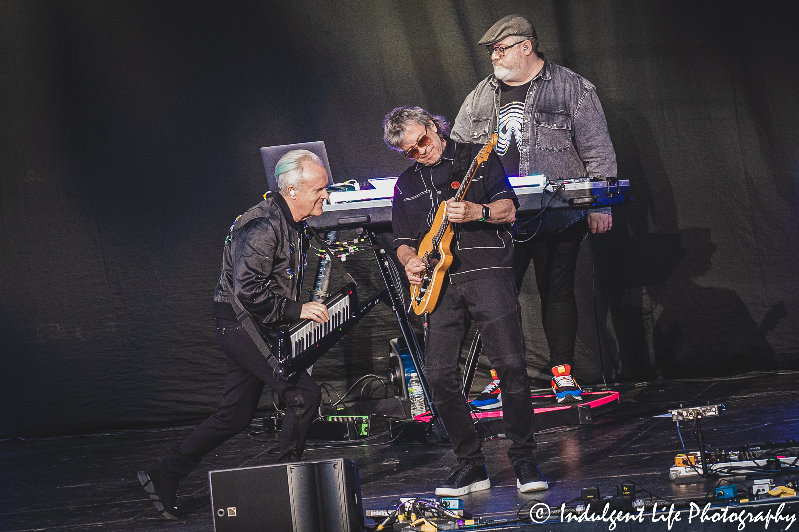 Howard Jones performing live with guitarist Robin Boult and keyboard player Robbie Robbie Bronnimann at Starlight Theatre in Kansas City, MO on August 8, 2023.