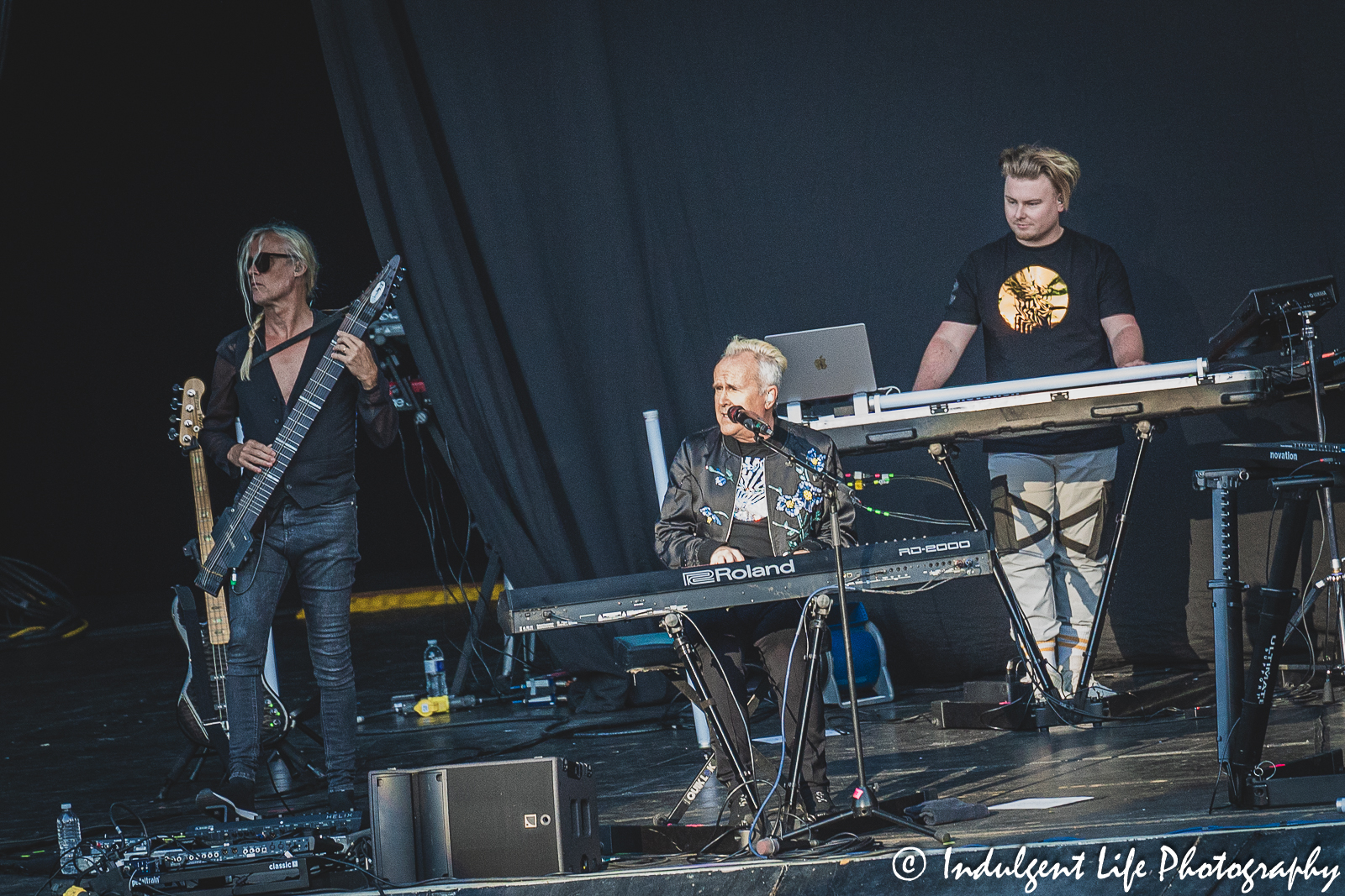 Howard Jones playing the keyboard with Dan Clarke alongside and Nick Beggs of Kajagoogoo on bass at Starlight Theatre in Kansas City, MO on August 8, 2023.