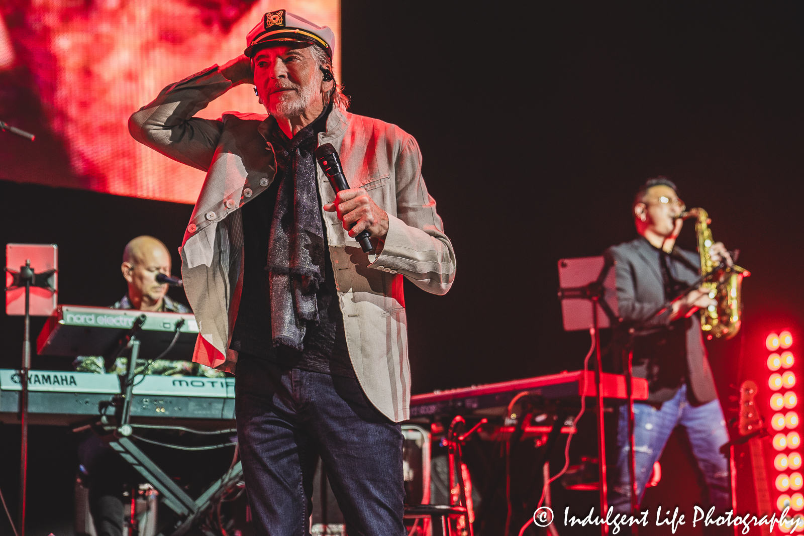 Kenny Loggins wearing a fan's yacht boat captain's hat during his "This Is It!" farewell tour stop at The Family Arena in St. Charles, MO on August 7, 2023.