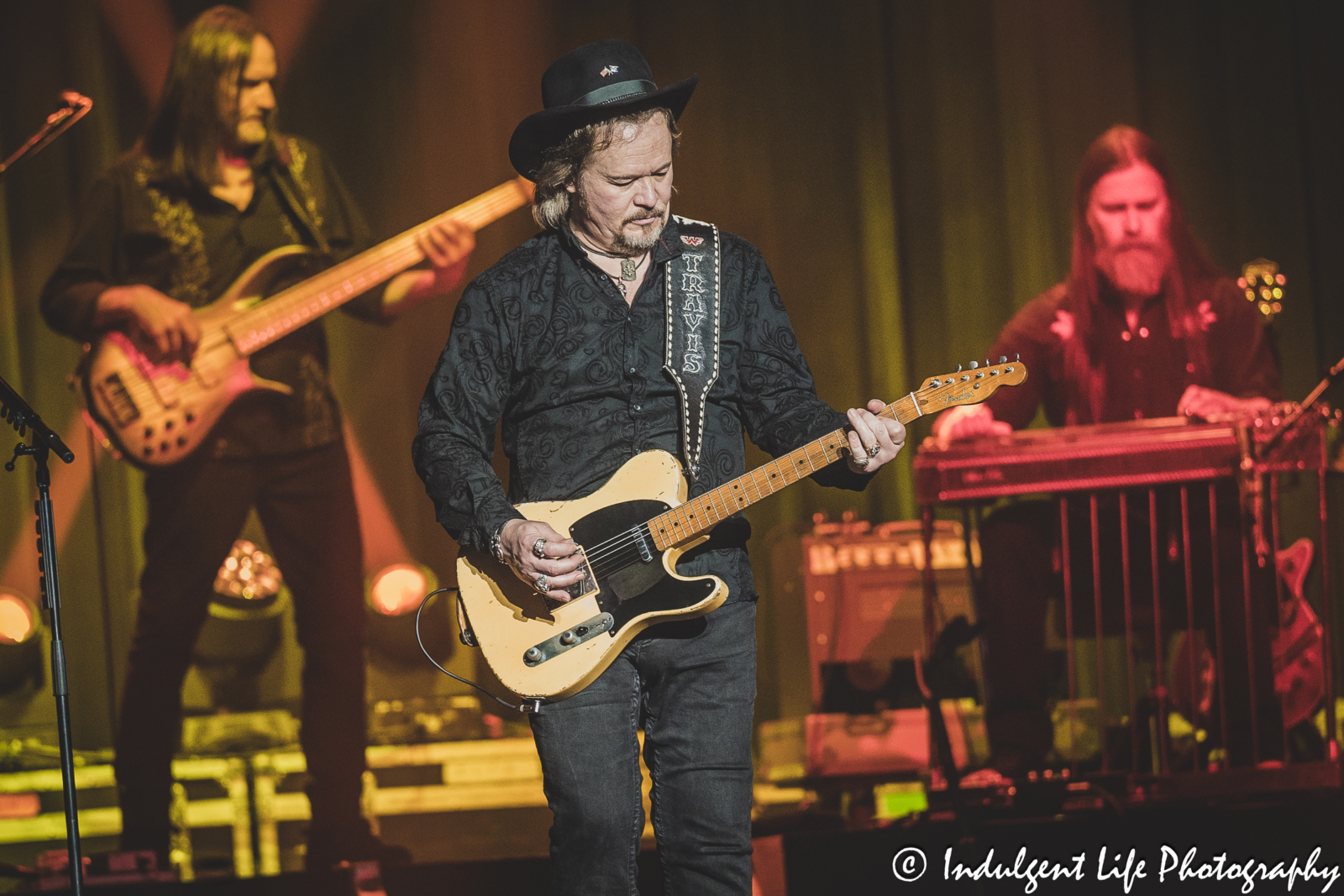 Travis Tritt playing the electric guitar live in concert at Ameristar Casino's Star Pavilion in Kansas City, MO on September 16, 2023.