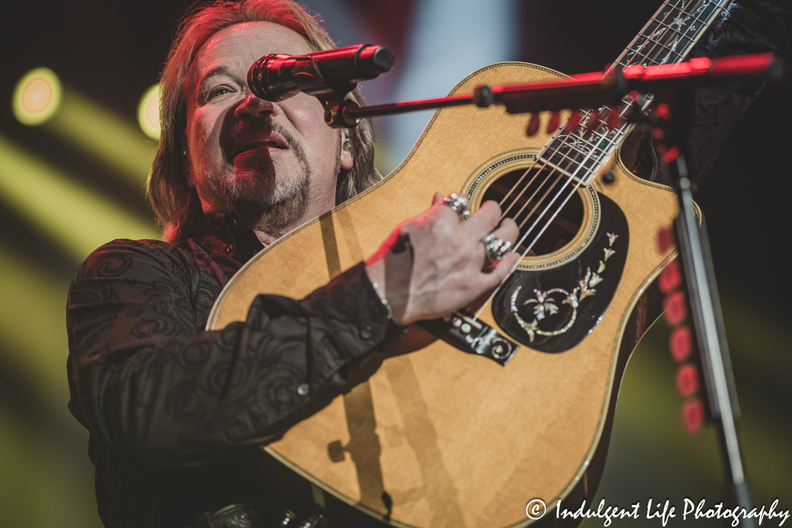 Travis Tritt performing live on the acoustic guitar at Star Pavilion inside of Ameristar Casino in Kansas City, MO on September 16, 2023.