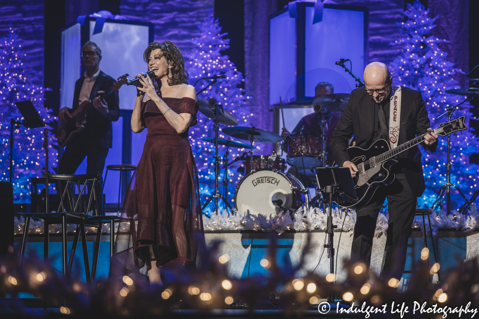 Amy Grant performing live with her bandmates during her Christmas Live show at Music Hall in downtown Kansas City, MO on November 30, 2023.