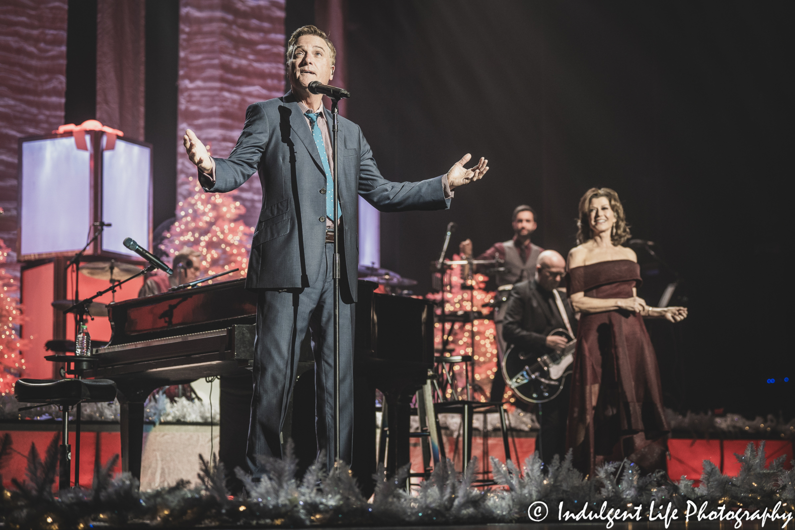 Michael W. Smith and Amy Grant performing live together during their Christmas concert at Music Hall in downtown Kansa City, MO on November 30, 2023.