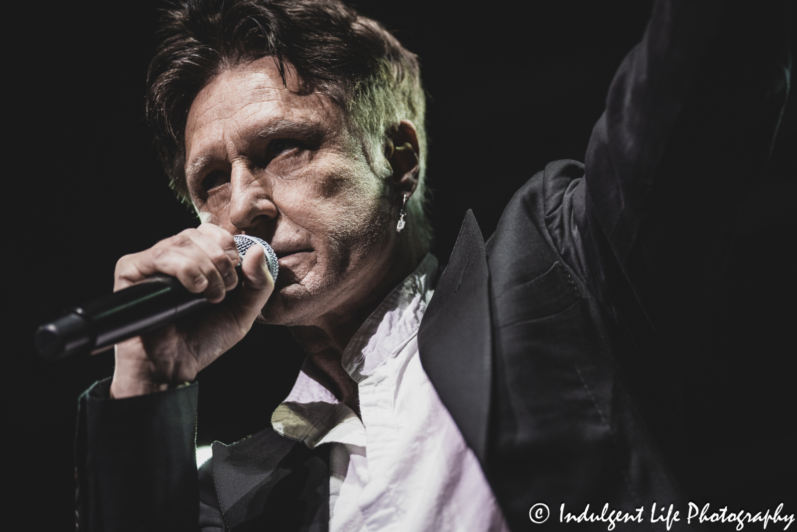 John Waite singing his solo tune "Tears" during his "Missing You" 40th Anniversary concert at Star Pavilion inside of Ameristar Casino in Kansas City, MO on December 8, 2023.