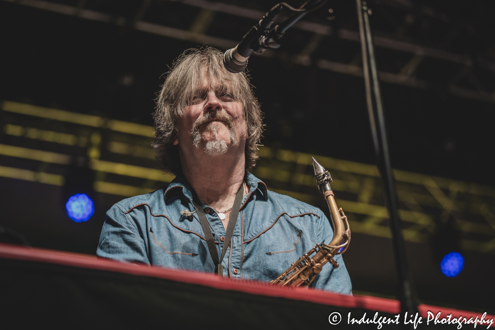 The Marshall Tucker Band member Marcus James Henderson playing the keyboard and saxophone live at Ameristar Casino's Star Pavilion in Kansas City, MO on December 1, 2023.