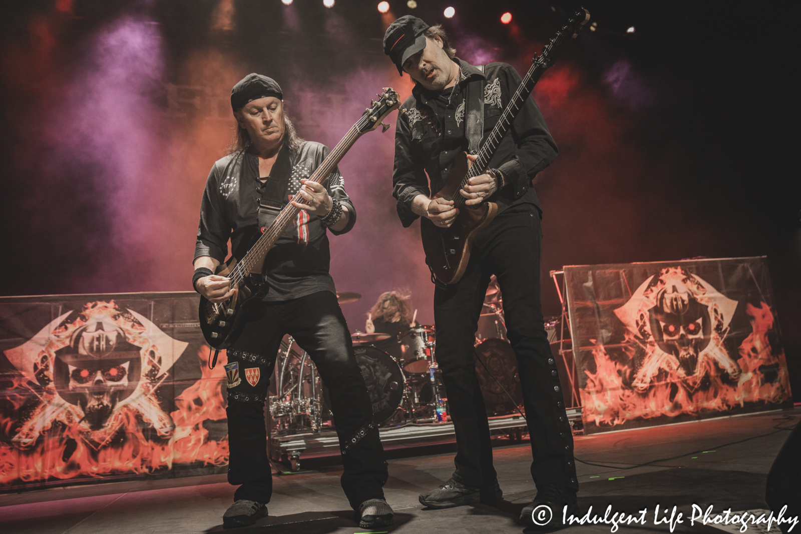 Firehouse bass player Allen McKenzie and guitarist Bill Leverty performing together at Hy-Vee Arena in Kansas City, MO on March 22, 2024.