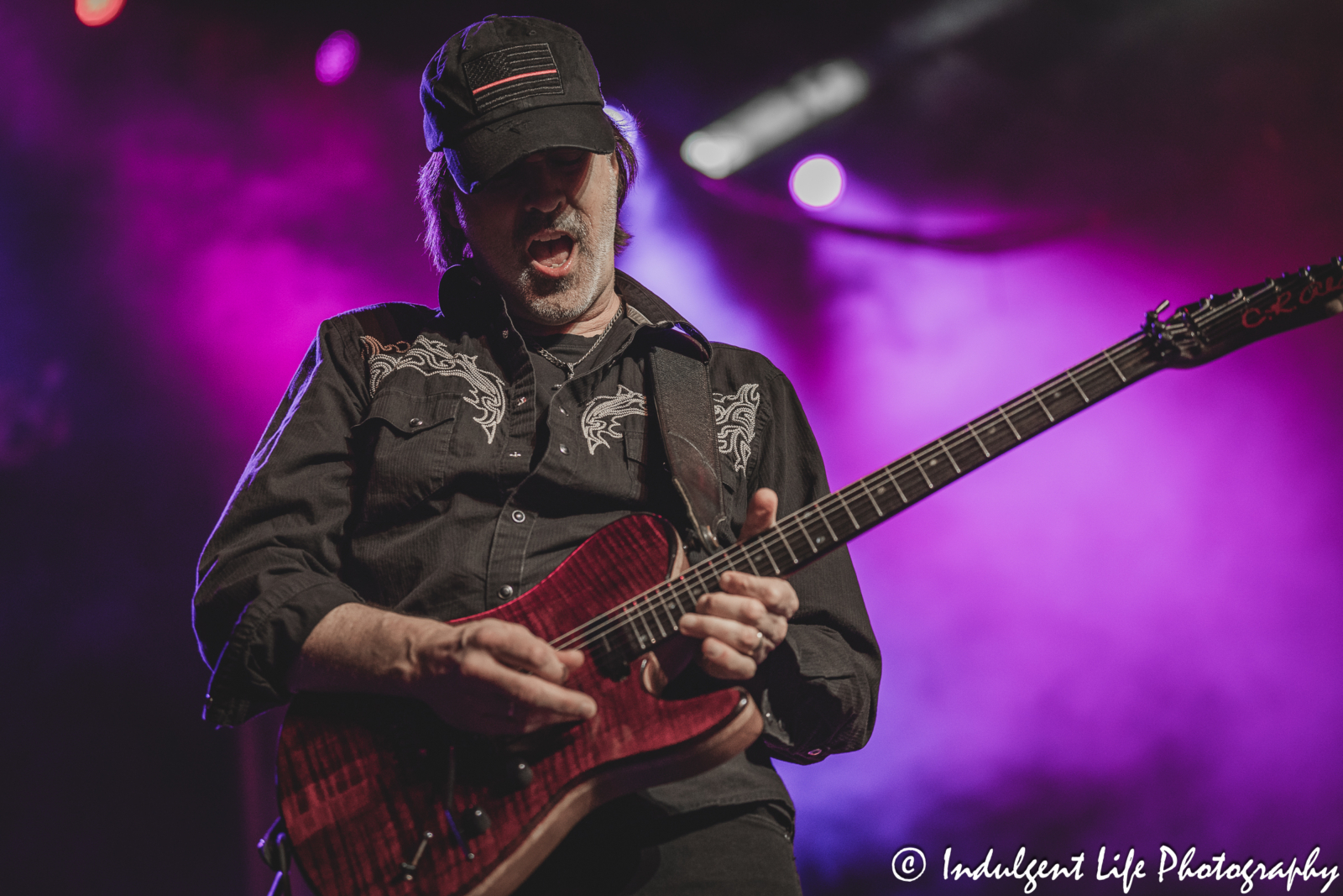 Bass player Bill Leverty of Firehouse performing live in concert at Hy-Vee Arena in Kansas City, MO on March 22, 2024.