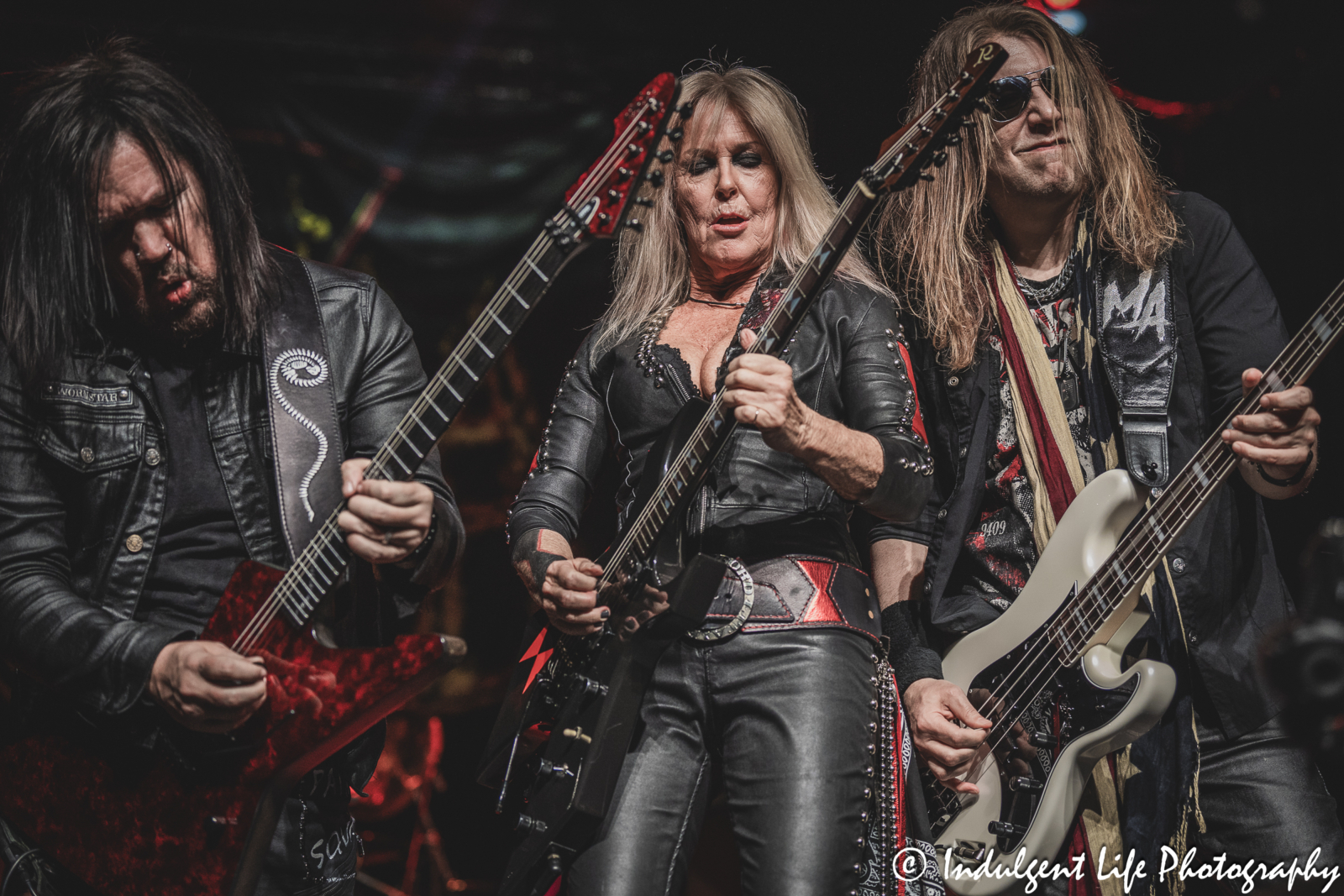 Lita Ford performing with guitarist Patrick Kennison and bass player Marten Andersson at Hy-Vee Arena in Kansas City, MO on March 22, 2024.